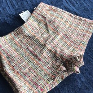 Cute tweed multicolored skirt/shorts.